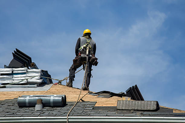 Professional Roof Replacement technician working in Evergreen, MT